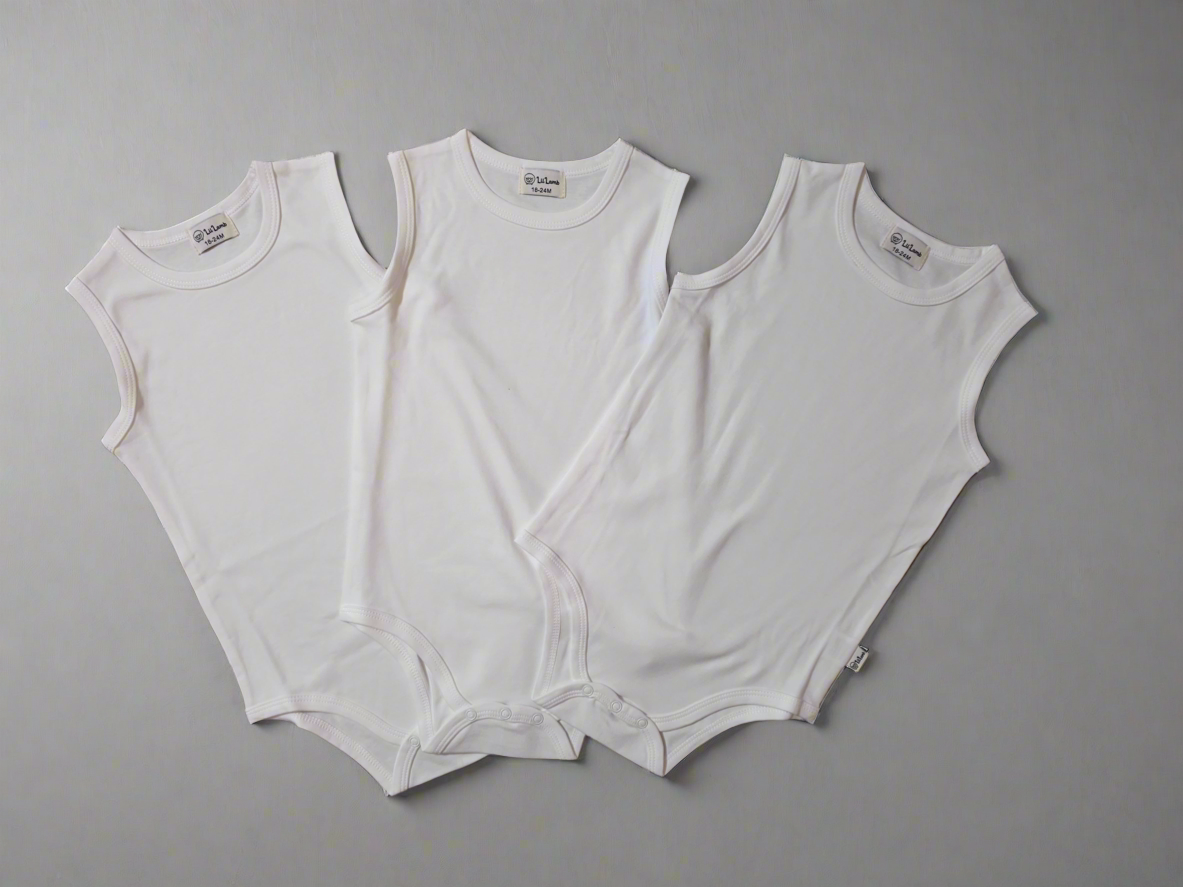 Three white sleeveless rompers on a gray background